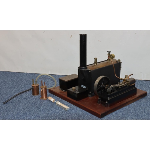 790 - A Stuart stationary live model steam engine mounted on mahogany base, 37cm x 34cm