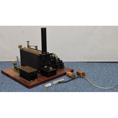 790 - A Stuart stationary live model steam engine mounted on mahogany base, 37cm x 34cm