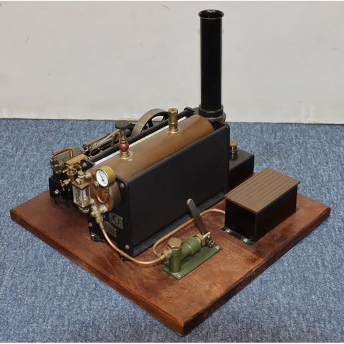 790 - A Stuart stationary live model steam engine mounted on mahogany base, 37cm x 34cm