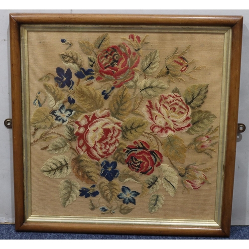 797 - A 19th Century wool work picture depicting roses, in mahogany frame, 45cm square overall.