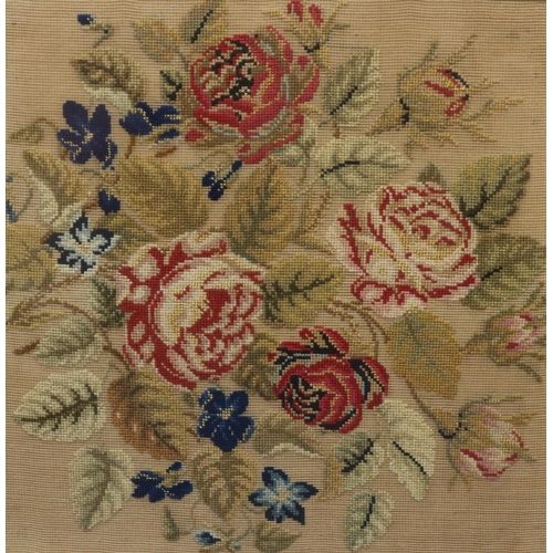 797 - A 19th Century wool work picture depicting roses, in mahogany frame, 45cm square overall.