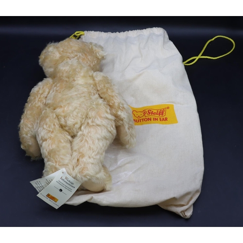 800 - A modern Steiff teddy bear, 32cm high with original bag