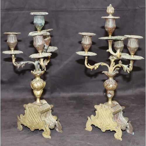 804 - A pair of spelter 4-light candelabras with turned stems on splayed bases inset with china panels, 35... 