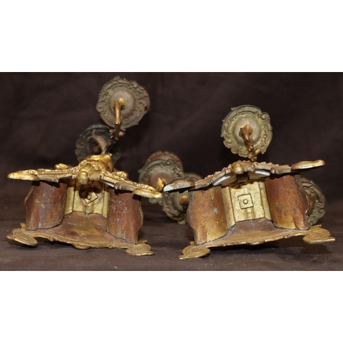 804 - A pair of spelter 4-light candelabras with turned stems on splayed bases inset with china panels, 35... 