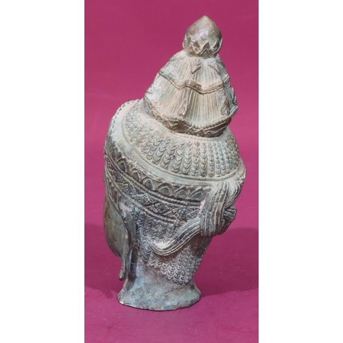 805 - An Eastern Bronze figurehead of a lady 23cm high