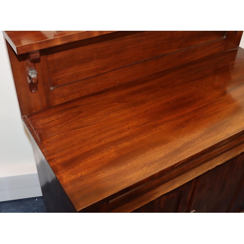 807 - A 19th Century mahogany chiffonier with shelf back, 1 long drawer above 2 panel doors with carved sc... 