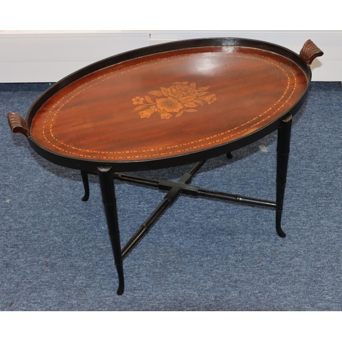 812 - A mahogany oval 2-handled tray with marquetry centre and inlaid boxing, on stand, 72cm wide (2)