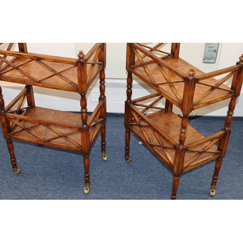 813 - A pair of burr elm 20th Century 2-tier étagère with gallery tops and turned stems and legs, on gilt ... 