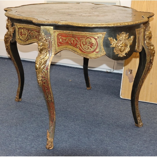 815 - A 19th Century Boulle scallop shaped writing table with allover raised figurehead, leaf and scroll d... 