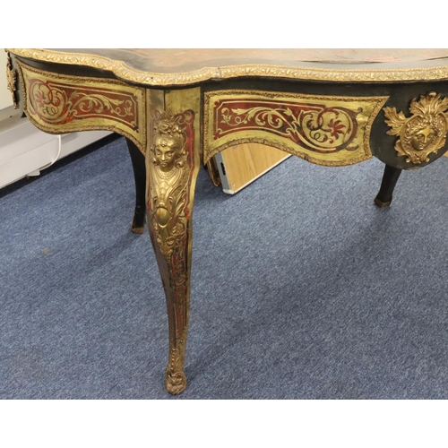 815 - A 19th Century Boulle scallop shaped writing table with allover raised figurehead, leaf and scroll d... 