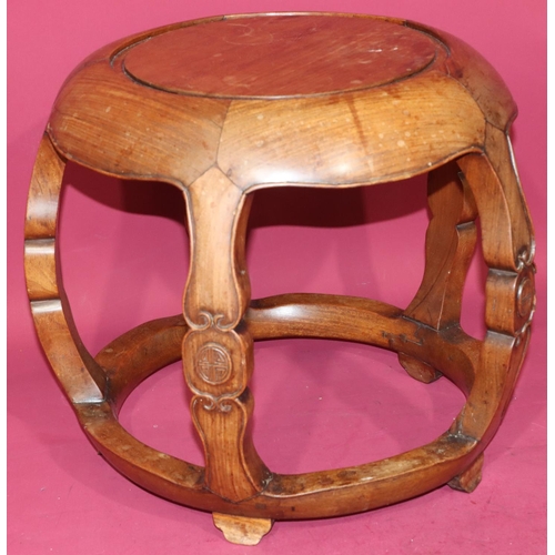 817 - An Oriental hardwood circular bulbous shaped coffee table on 4 shaped supports with further circular... 