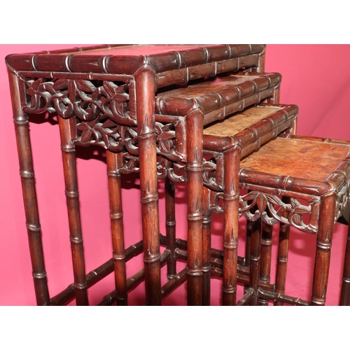 821 - An Oriental quartetto set of coffee tables with bamboo style rims and legs, largest 49cm wide, 35cm ... 