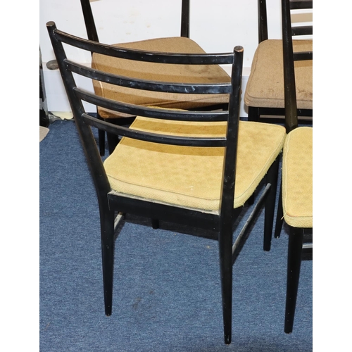 828 - A set of 6 Meredew ebonised single chairs on round tapering legs (some ebony rubbed and seats in nee... 