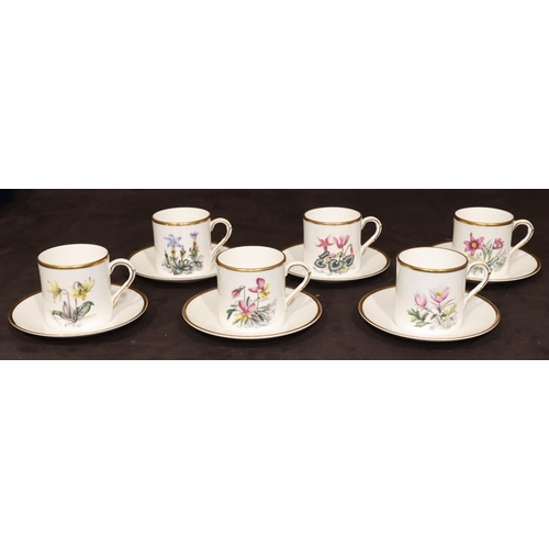 84 - A set of 6 Royal Worcester coffee cans and saucers on white ground with various multi-coloured flora... 