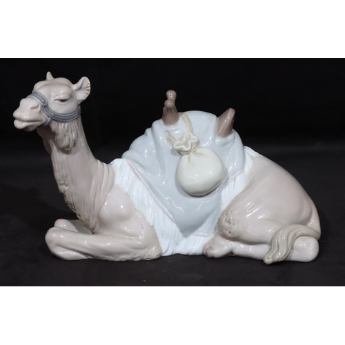 93 - A Lladro figure of a resting camel, 24cm wide, 15.5cm high