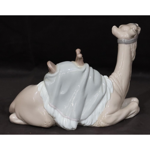 93 - A Lladro figure of a resting camel, 24cm wide, 15.5cm high