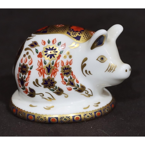 99 - A Royal Crown Derby Imari pattern paperweight in the form of a pig with silver coloured stopper, 5cm... 