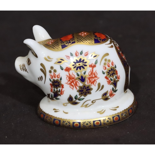 99 - A Royal Crown Derby Imari pattern paperweight in the form of a pig with silver coloured stopper, 5cm... 