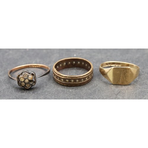 487 - A 9ct gold signet ring, size M/N, 1.5 grams, a 9ct gold eternity ring set with clear stones and a 9c... 