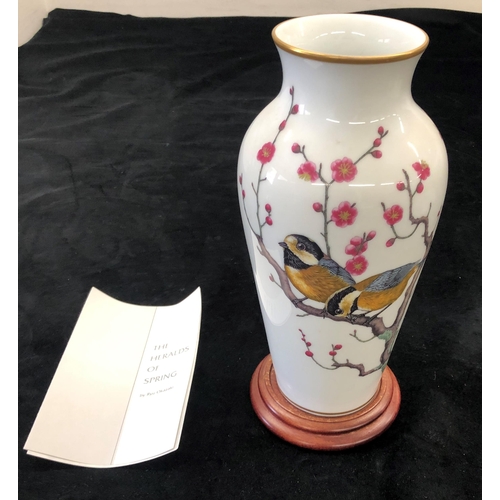 7005 - A Franklin Porcelain The Heralds of Spring vase, 30cm high with certificate of authenticity and wood... 