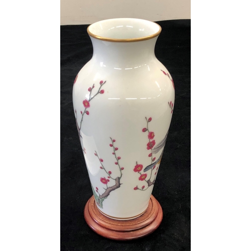 7005 - A Franklin Porcelain The Heralds of Spring vase, 30cm high with certificate of authenticity and wood... 