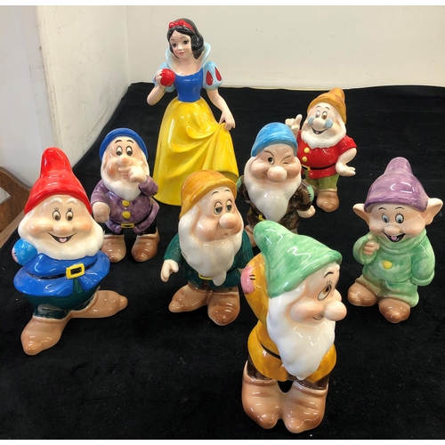 7015 - A set of Disney Snow White and the Seven Dwarves,  stamped Disney Japan, Snow White 27cm high. (8)