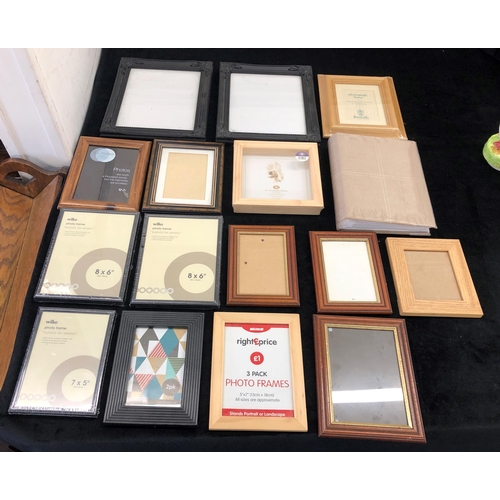 7018 - 15 various photograph frames and a photograph album. (16)