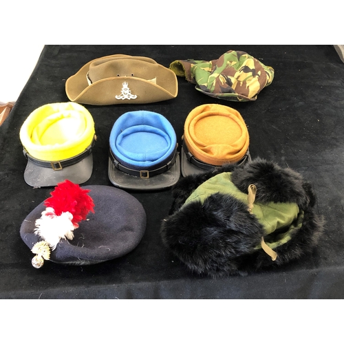 7028 - Various military hats, including a NATO stock no. 8405-99-976-0241, a Fayrefield Melbourne 55 hat et... 