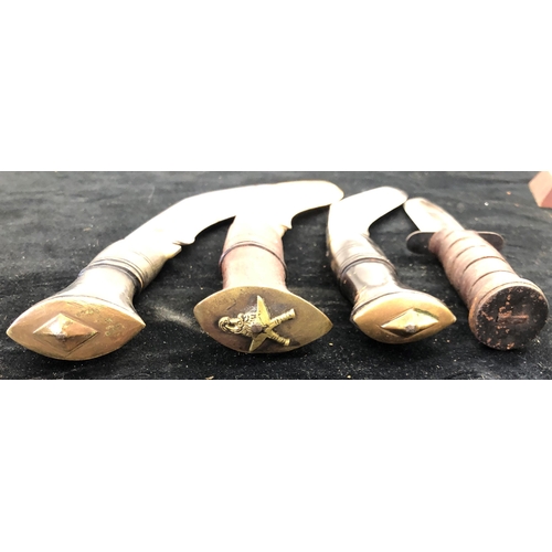 7031 - 3 Khukuri knives with 2 leather sheaths, 1 with 2 small penknives and 1 other knife stamped Japan wi... 