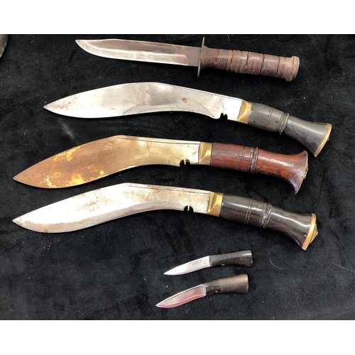 7031 - 3 Khukuri knives with 2 leather sheaths, 1 with 2 small penknives and 1 other knife stamped Japan wi... 