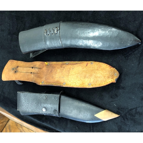 7031 - 3 Khukuri knives with 2 leather sheaths, 1 with 2 small penknives and 1 other knife stamped Japan wi... 