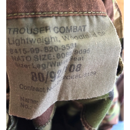 7041 - A Highlander TT167-HC Recon pack rucksack, a pair pf lightweight Woodland combat trousers  80/92/108... 