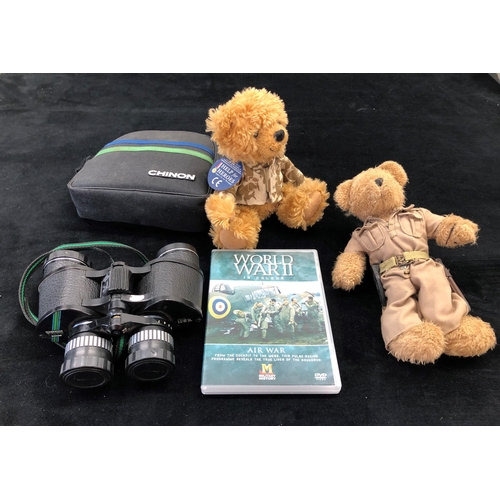 7042 - A pair of Chinon Sportsman 7-15 x 35 binoculars in zipped case, a World War II in colour DVD a Help ... 