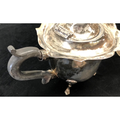 7051 - A silver plated muffin dish, teapot (handle loose), 8 goblets and a pair of sugar nips.