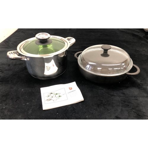 7063 - A black Pryrex cast iron 28cm  2-handled pan with glass lid and a Cookware 01810 Edelstahl Induction... 