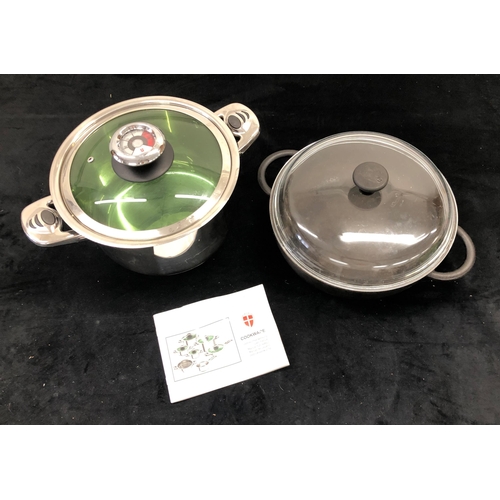 7063 - A black Pryrex cast iron 28cm  2-handled pan with glass lid and a Cookware 01810 Edelstahl Induction... 