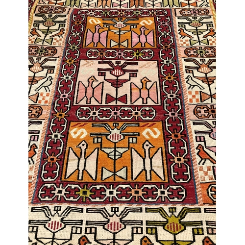 7068 - A Kilim style woven rug, 71 x 92cm (some fraying to 1 end).