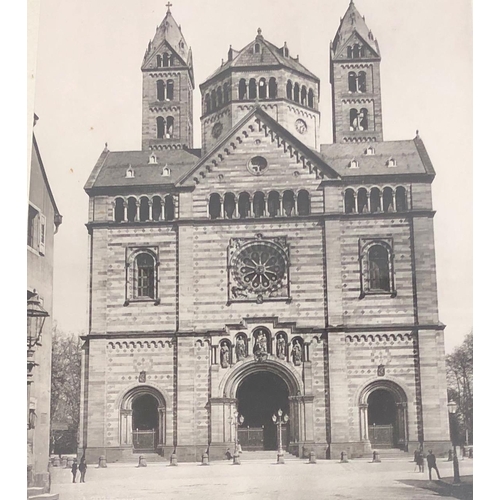 7076 - A print of a church, 25.5 x 32cm in wood frame and a sepia print of people by a market stall, 26 x 1... 