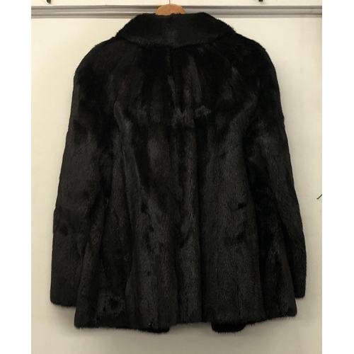 7089 - A Maxwell Croft London. Bath dark brown fully lined fur jacket, 1 side pocket, metal clips and hooks... 