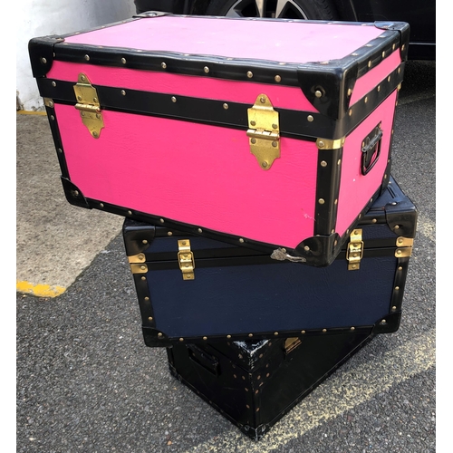 7097 - 2 Mossman miniature trunks (pink and blue), 51.5cm wide, 32cm deep, 28cm high and 1 other black trun... 