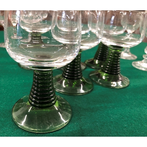 7099 - 8 modern heavy based small glasses, 8cm high, 6 modern small wine glasses with green bases and twist... 