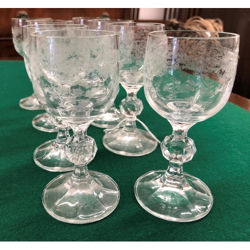 7099 - 8 modern heavy based small glasses, 8cm high, 6 modern small wine glasses with green bases and twist... 