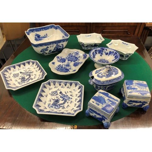 7102 - A quantity of blue and white china.