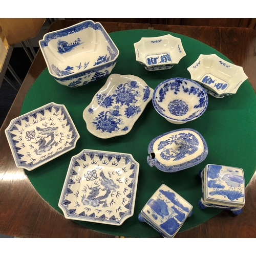 7102 - A quantity of blue and white china.