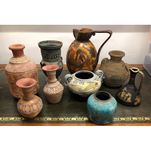 7103 - Various earthenware jugs, tallest 23xm high.