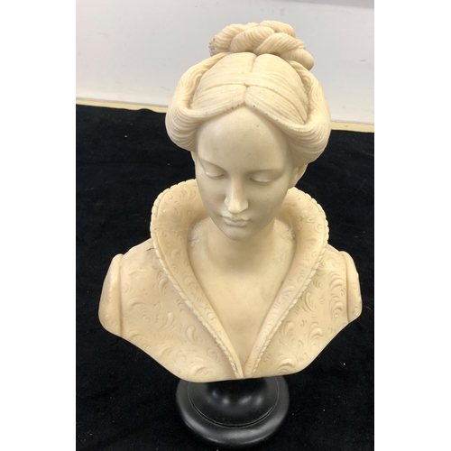 7109 - A composition bust of a lady, 32cm high.