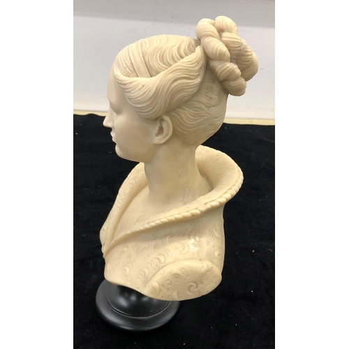 7109 - A composition bust of a lady, 32cm high.