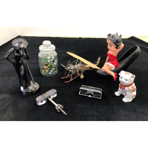 7117 - A metallic model plane, 34cm long, a Betty Boop figure, 25.cm high, a jar containing a mixed quantit... 