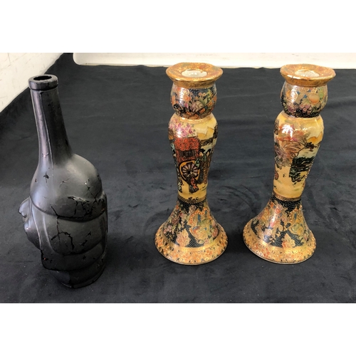 7141 - A pair of reproduction multi-coloured candlesticks stamped Satsuma to base, 26cm high and a blackene... 