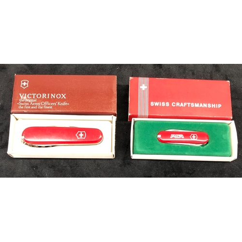 7143 - A Victorinox Swiss Army Officer's Knife, complete with fitted retailer's box and another smaller Vic... 